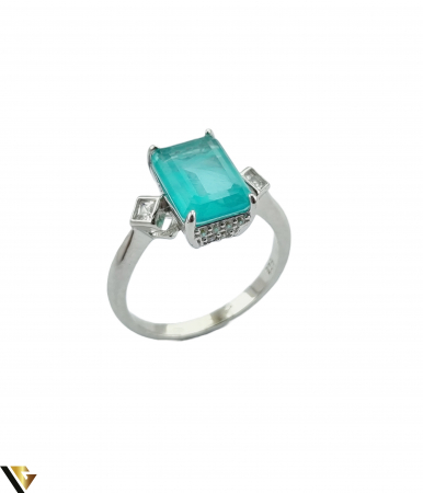 Inele din argint - Inel din argint, 925 4.02 grame Piatra Paraiba, cu fatetare avand dimensiuni de 8 mm / 12 mm Stralucire deosebita, cu nuante de turcoaz neon Anturaj cu cristale de zirconiu Diametrul inelului este de 19 mm, masura UE:20, masura standard RO:60 (circumferinta) Latime maxima 13 mm Produs Nou Marcaj cu titlul "925" Locatie HARLAU  * * * * * * * * * * * * *