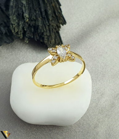 Inele din aur - Inel aur 14k, Cristale de zirconiu Greutate: 1.54 grame Latime: 7 mm Diametru: 18.50 mm Masura: UE 17 / RO 57 (circumferinta) Marcaj /  titlu: "585" Locatie: Bacau Calea Marasesti Tel: 0756943079