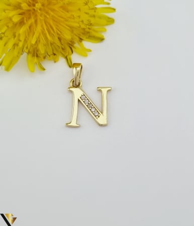Bijuterii din aur - Pandantiv aur 14K,initiala "N" Greutate:0.69 g Lungime:16.00 mm ( cu anou ) Latime:8.40 mm Marcaj / Titlu: 585 Locatie: HARLAU Tel.0723 353 111