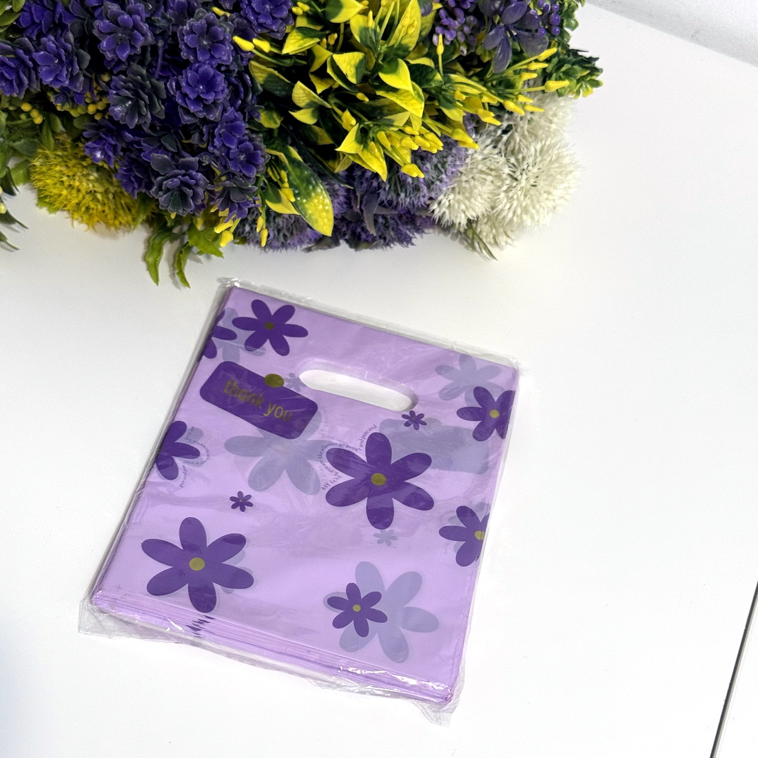 Set 100 pungi plastic mov imprimeu flori mov 20cm x 15cm [2]