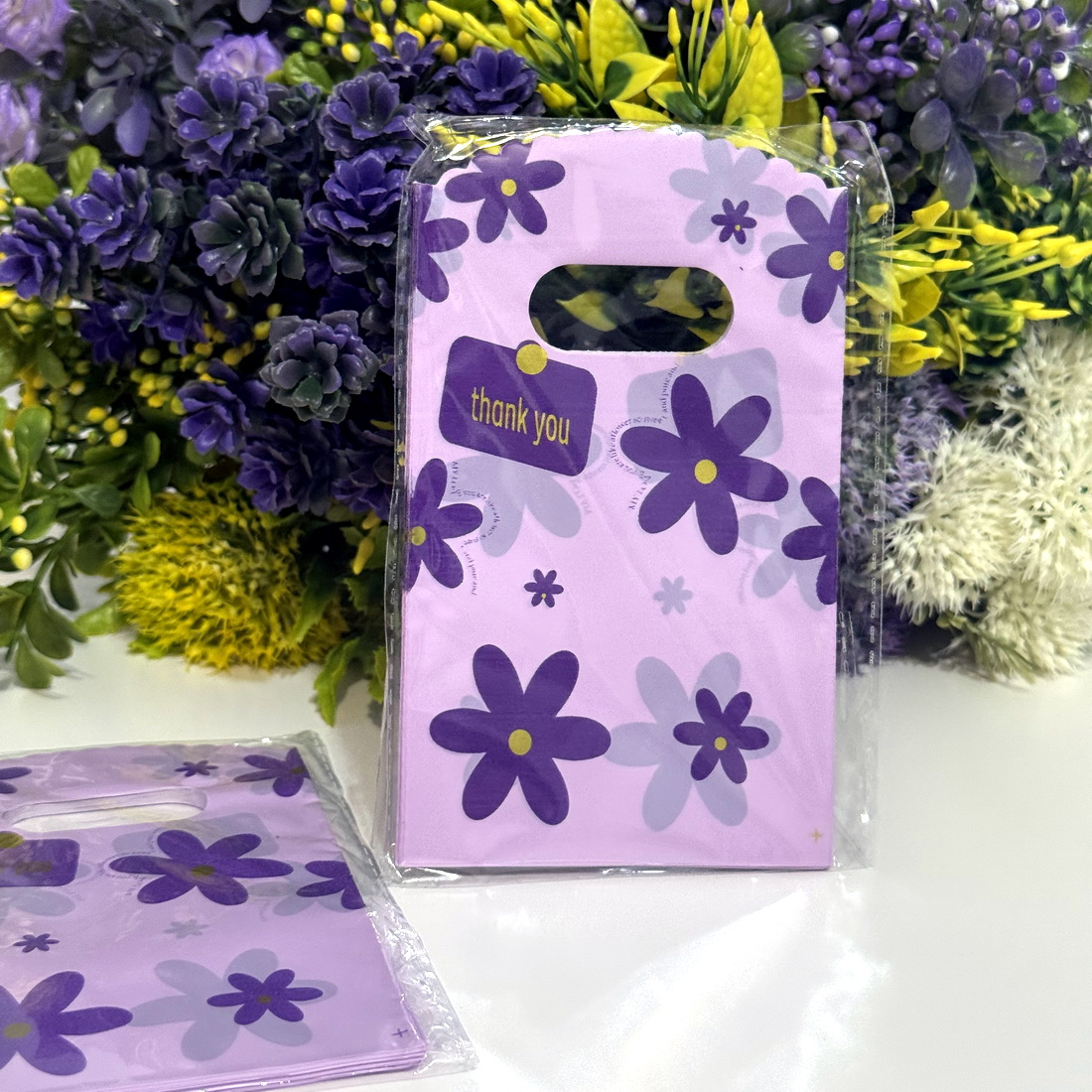 Set 100 pungi plastic mov imprimeu flori mov 15cm x 9cm [5]