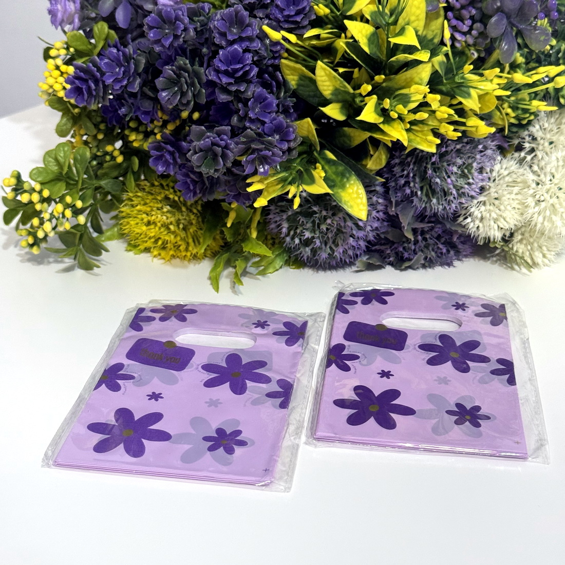Set 100 pungi plastic mov imprimeu flori mov 15cm x 9cm [4]