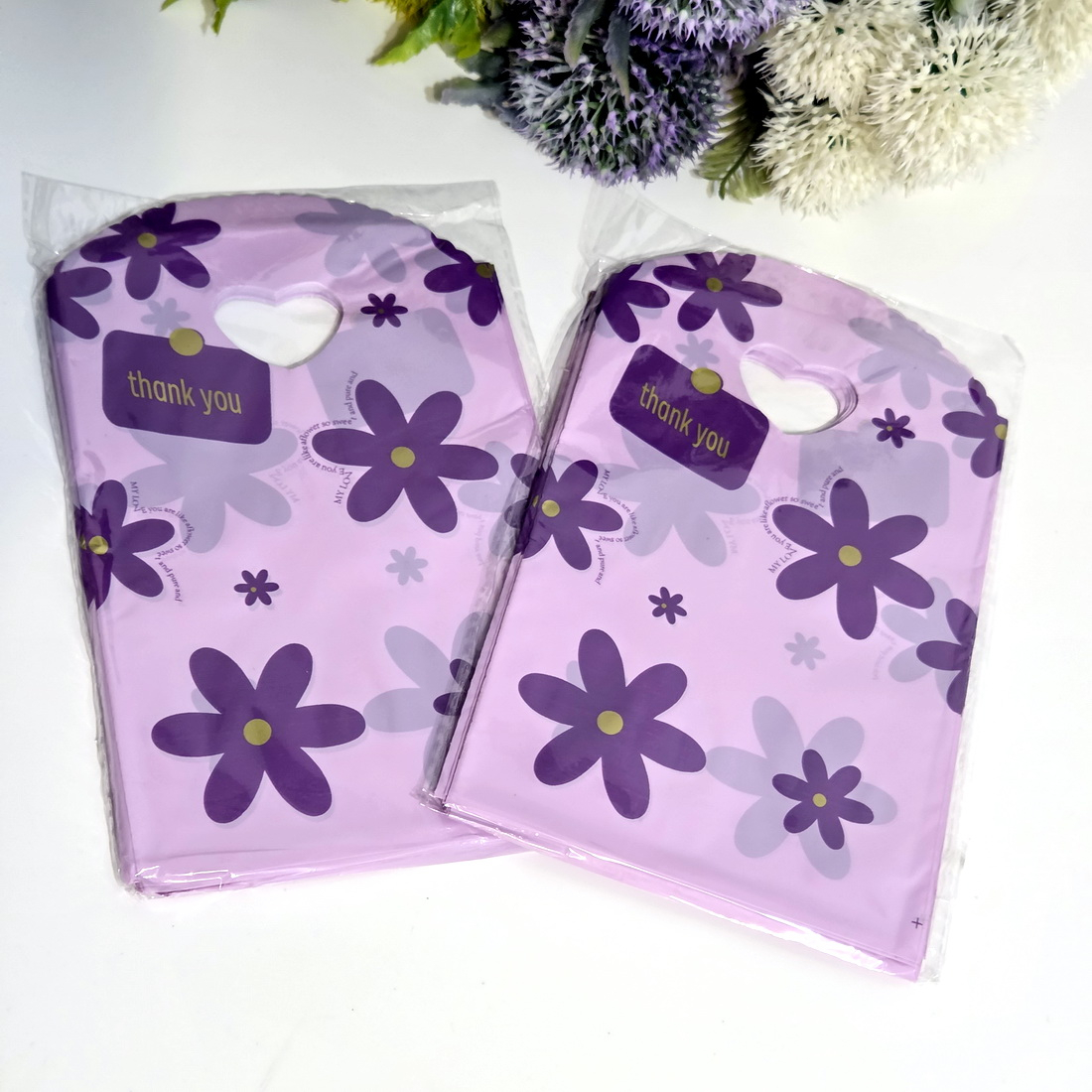 Set 50 pungi plastic mov imprimeu flori mov 21cm x 13cm [2]