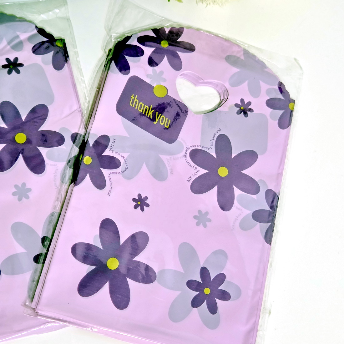 Set 50 pungi plastic mov imprimeu flori mov 21cm x 13cm [3]