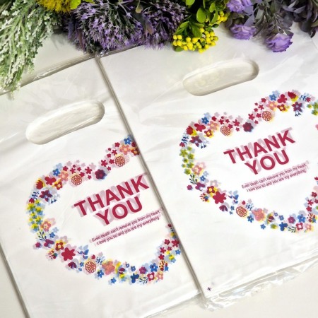 Set 100 pungi din plastic albe model inima 30cm x 20cm [1]