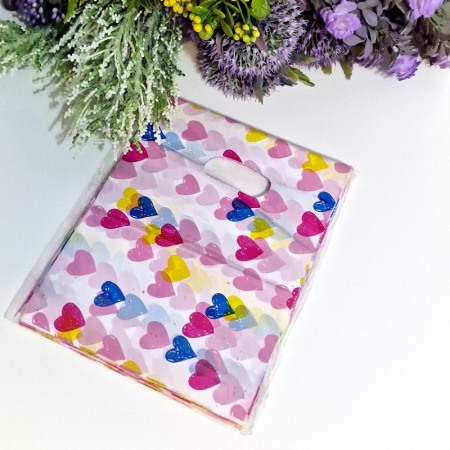 Set 100 pungi din plastic cu inimi multicolore 20cm x 15cm [1]