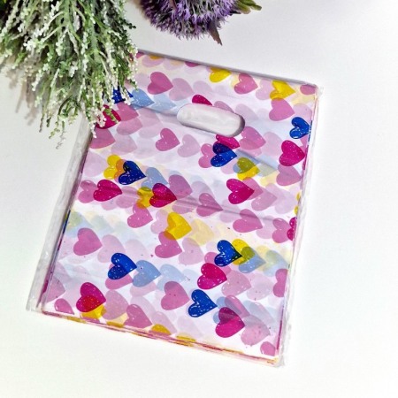 Set 100 pungi din plastic cu inimi multicolore 20cm x 15cm