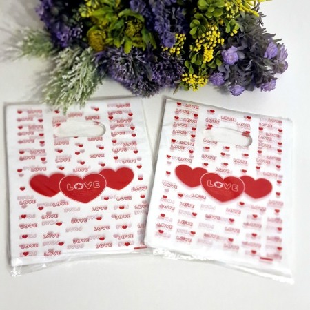 Set 100 pungi din plastic inima rosie 25cm x 20cm [3]