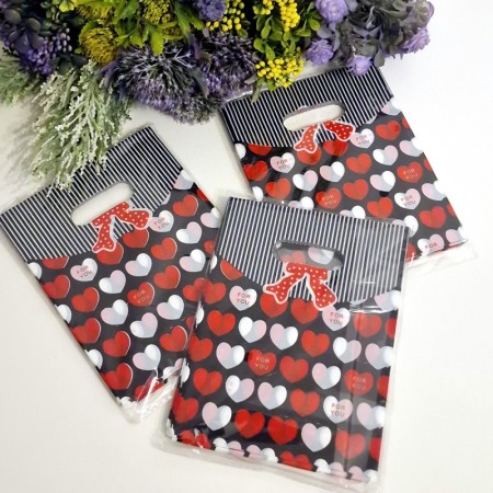 Set 100 pungi din plastic inimi rosii si albe 20cm x 15cm [4]