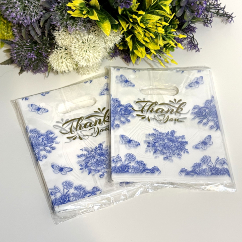 Set 100 pungi din plastic imprimeu albastru flori si fluturi 20cm x 15cm [2]