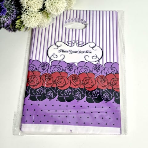 Pungi din plastic si seturi de pungi - Set 100 pungi plastic imprimeu trandafiri 30cm x 20cm