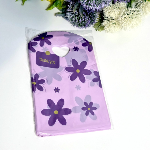 Noutăți - Set 50 pungi plastic mov imprimeu flori mov 21cm x 13cm