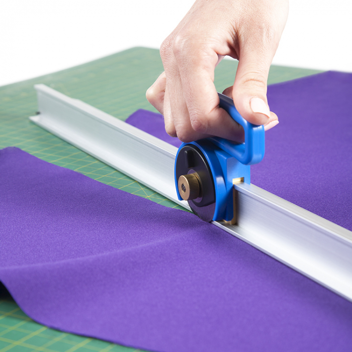 Aluminum rotary slide cutter for precise cutting of knitted and woven fabrics, paper, leather, vinyl etc. Allows to cut multiple layers of material, with maximum thickness of 5 mm. Equipped with 45 mm [3]