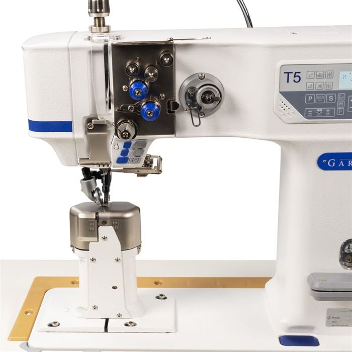 Single needle direct drive post bed industrial machine with upper driven roller, needle and lower circular feed [3]