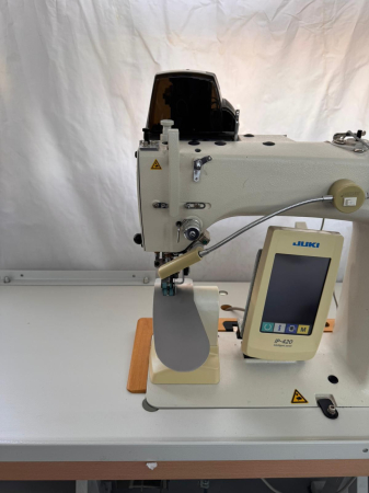 Echipamente reconditionate - Masina automata de montat maneci Juki DP2100