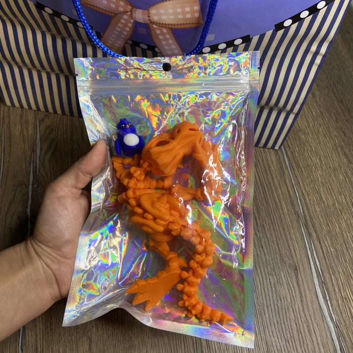 Jucărie Flexibilă, Schelet T-Rex cu mini-Ziglut, Dinozauri, Portocaliu, 25 cm [2]