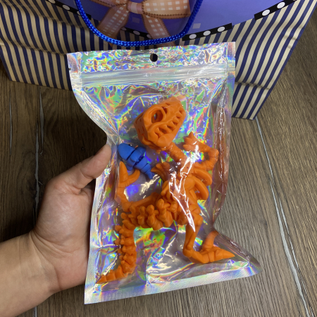 Jucărie Flexibilă, Schelet Raptor cu mini-Ziglut, Dinozauri, Portocaliu, 25 cm [1]