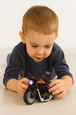 Jucarii Copii - Motocicleta copii Champion neagra 1:14 lumini sunete pull back baterii incluse