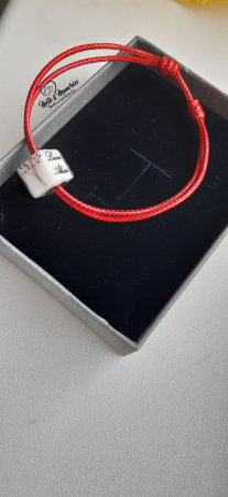 Charm tip cub, cu baza din argint,,ce contine lapte matern, suvita bebelusului si bucati din cordonul ombilical [4]