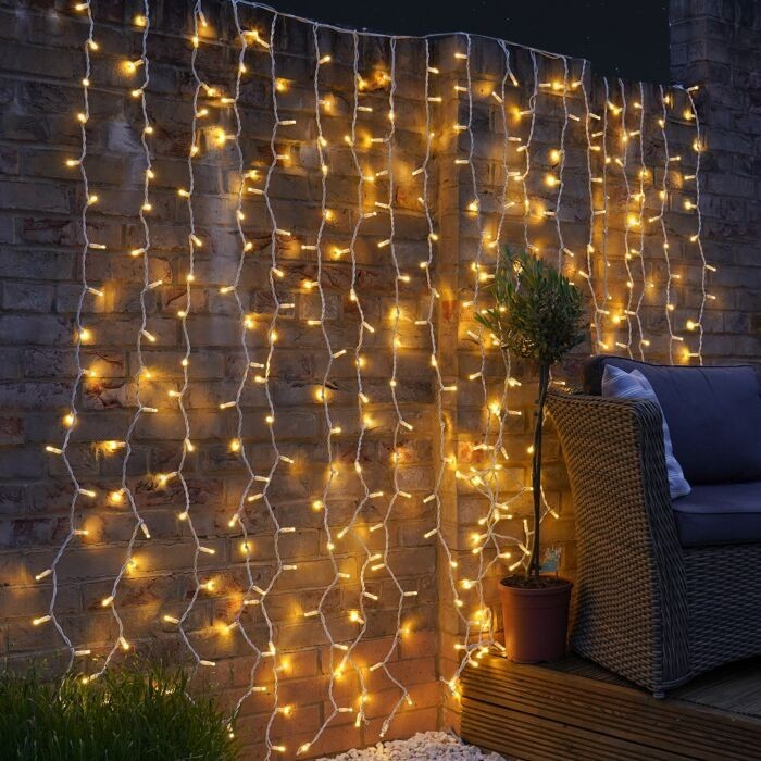 Instalatie Craciun, Tip Perdea, IP44, 6 m x 3 m, 480 LED-uri, Alb Cald, cu 8 jocuri de lumini, 31 V, 9W, Interconectabila, Prelungitor 3 m inclus, Fir transparent, Interior/ Exterior, Flippy [1]