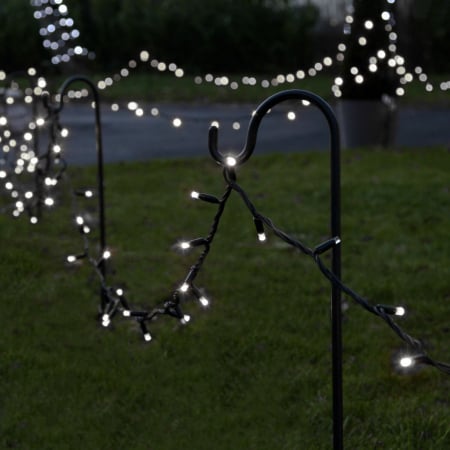 Decoratiuni, ornamente si articole Craciun - Instalatie de Craciun Liniara Yoto, 50 m, 1 m Prelungitor 220V, 498 LED, 8 Jocuri de Lumini, Controler, Fir Negru, Utilizare Interior/Exterior, Protectie anti-inghet, Fir Cupru, Alb Rece