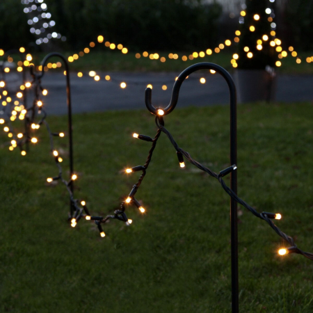 Decoratiuni, ornamente si articole Craciun - Instalatie de Craciun Liniara Yoto, 50 m, 1 m Prelungitor 220V, 498 LED, 8 Jocuri de Lumini, Controler, Fir Negru, Utilizare Interior/Exterior, Protectie anti-inghet, Fir Cupru, Alb Cald