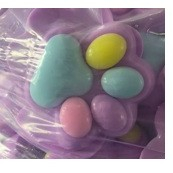 Sub 99 Lei - Jucarie Antistres Squishy, Flippy, cu Revenire Lenta, Labuta de Pisica Pufoasa, 8.5 x 7.5 cm, Ambalaj Transparent, Mov Multicolor