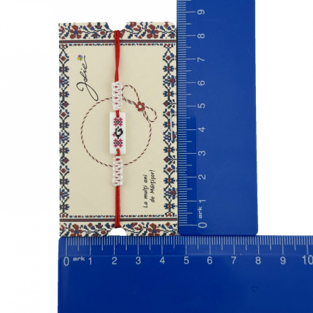 Martisor de Tip Bratara Norocoasa, Jolie, Ornament Central cu Motive Populare, Model Alb, Dimensiune Reglabila, Ambalaj Individual cu Design [1]