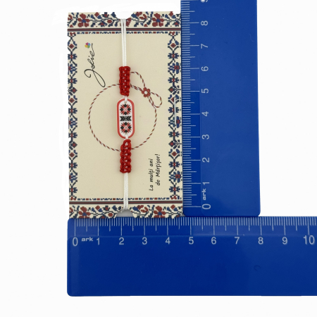 Martisor de Tip Bratara Norocoasa, Jolie, Ornament Central cu Motive Populare, Model Rosu, Dimensiune Reglabila, Ambalaj Individual cu Design [1]