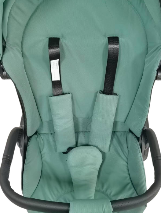 Tricicleta cu scaun reversibil Still, 6-36 luni, cu pozitie de somn si scaun tip fotoliu, pliabila, roata cauciuc, cu lumini si muzica,  verde [9]