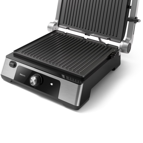 Gratar electric Philips HD6301/90 Seria 5000, 2200 W, inaltime reglabila, temperatura reglabila, curatare usoara, placi antiaderente detasabile, se deschide la 180°, tava de scurgere detasabila, maner [1]