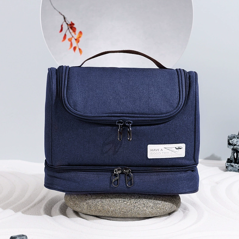 Organizatoare bagaje - Geanta textila de voiaj unisex pentru depozitare si transport articole cosmetice, Tecos®, dimensiuni 25* 11* 20 centimetri, cu agatatoare, albastru inchis