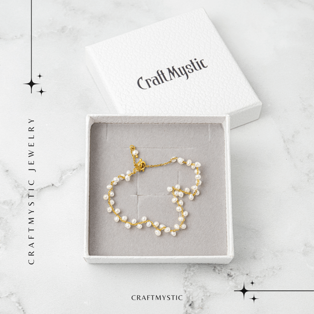 Bratara reglabila din perle de cultura si lant auriu– simbol al feminitatii pure [7]