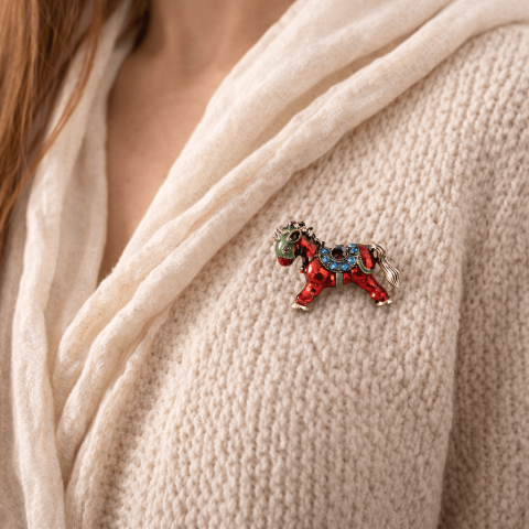 Brosa Cal de Foc – simbol al energiei si determinarii [1]