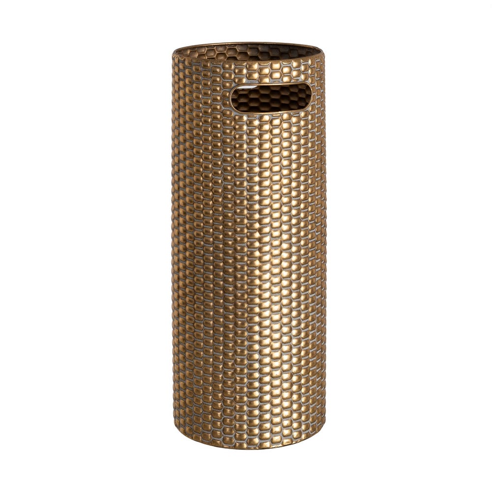 Stil de design - Suport pentru umbrele din metal auriu cu model în relief de fagure lângă o consolă