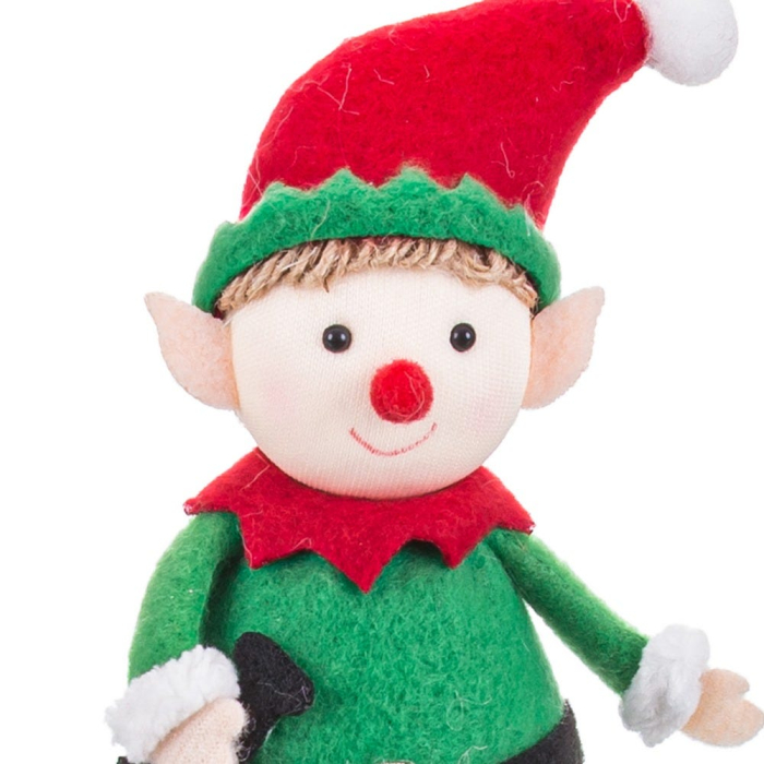 Elf așezat cu picioare lungi din textil cu costum verde și căciulă roșie pe un raft de sărbătoare [2]