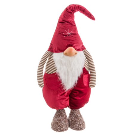 Obiecte decorative - Gnom de Crăciun textil uriaș cu căciulă roșie și brațe în dungi lângă brad