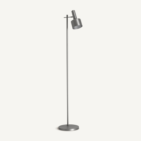 Stil de design - Lampadar din oțel argintiu mat cu tijă subțire, bază rotundă joasă și cap cilindric înclinat
