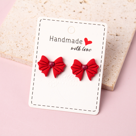 BIJUTERII - Cercei fundiță roșii stilizați