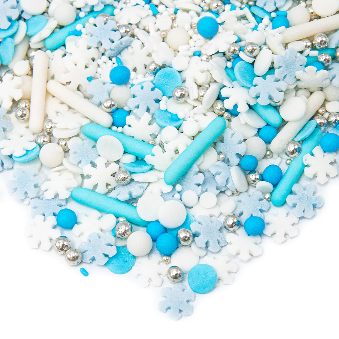 Mix Sprinkles din zahar colorate pentru decorarea produselor de cofetarie si patiserie. Decor albastru cu stelute albe si accente argintii - tematica de iarna. ​​​​​​​ Gramaj: 90g. Produs in: Germania. [2]