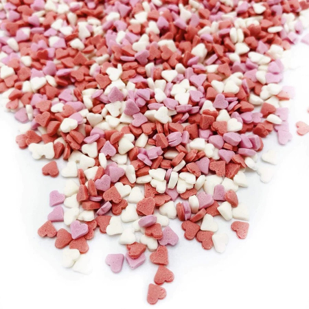 Mix Sprinkles din zahar colorate pentru decorarea produselor de cofetarie si patiserie. Inimioare mici roz, rosii si albe din zahar, ideale pentru Valentines Day si 8 Martie. [1]