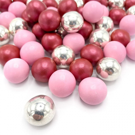 Mix Sprinkles bile din zahar si ciocolata pentru decorarea produselor de cofetarie si patiserie.   Gramaj: 130g. Produs in: Germania. [1]