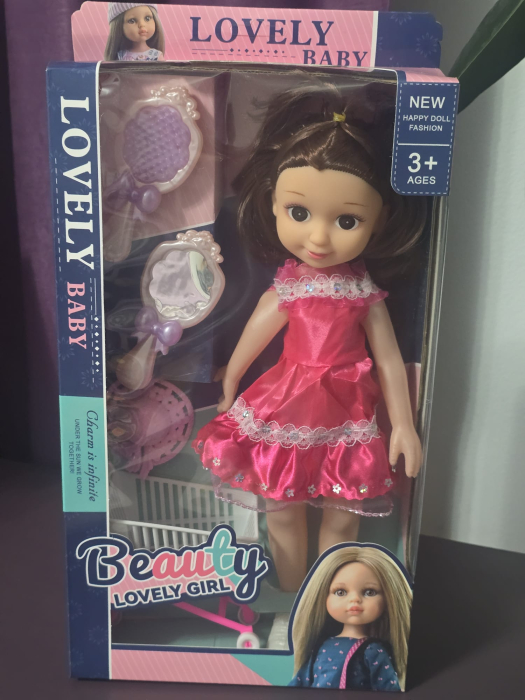 Papusa muzicala rochita noua [1]