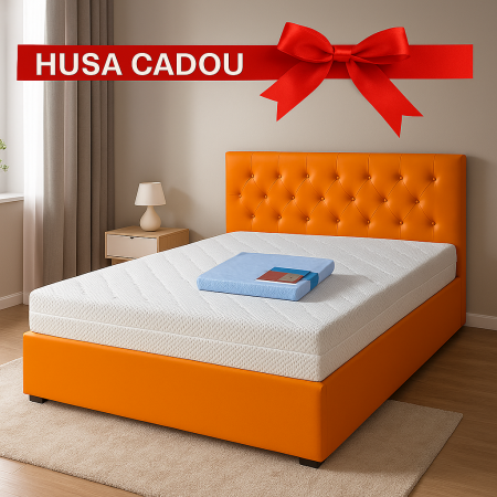 Saltele memory - Saltea Jupiter Memory One 160x200 așezată pe o somieră portocalie cu rezonanță