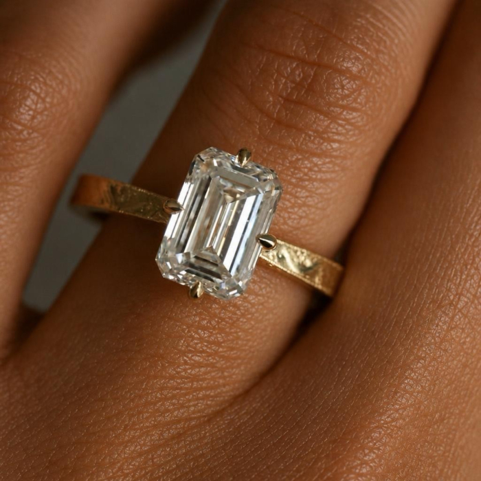 – Emerald Cut Lab-Ground Diamond Engagement Ring and Hidden Halo with Emeralds [9]