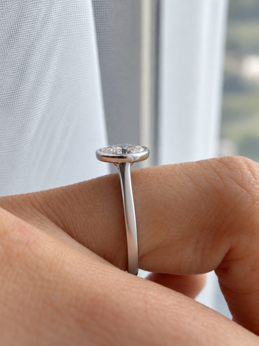 Engagement ring with an oval brilliant-cut D VVS1 moissanite, bezel setting | Gold or Platinum [15]