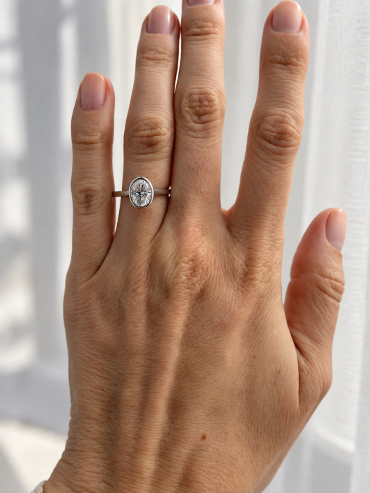 Engagement ring with an oval brilliant-cut D VVS1 moissanite, bezel setting | Gold or Platinum [13]