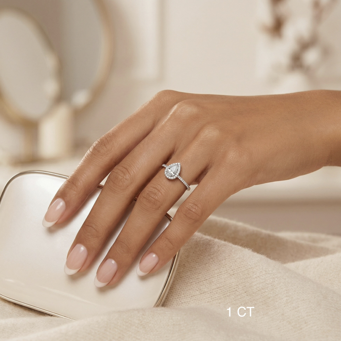 1-carat pear-shaped moissanite engagement ring with halo and pavé setting | gold or platinum [4]
