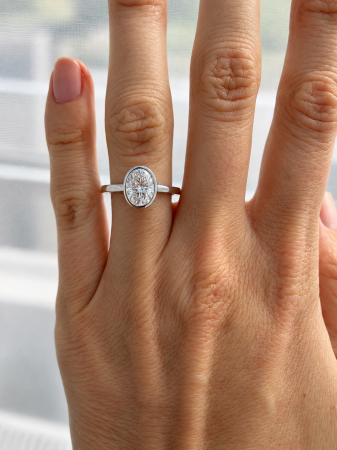 Engagement ring with an oval brilliant-cut D VVS1 moissanite, bezel setting | Gold or Platinum [16]