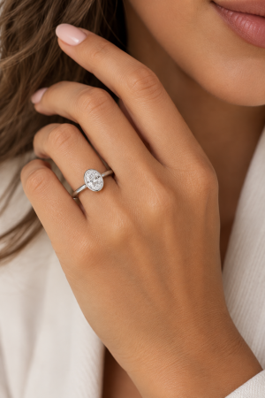 Engagement ring with an oval brilliant-cut D VVS1 moissanite, bezel setting | Gold or Platinum [10]